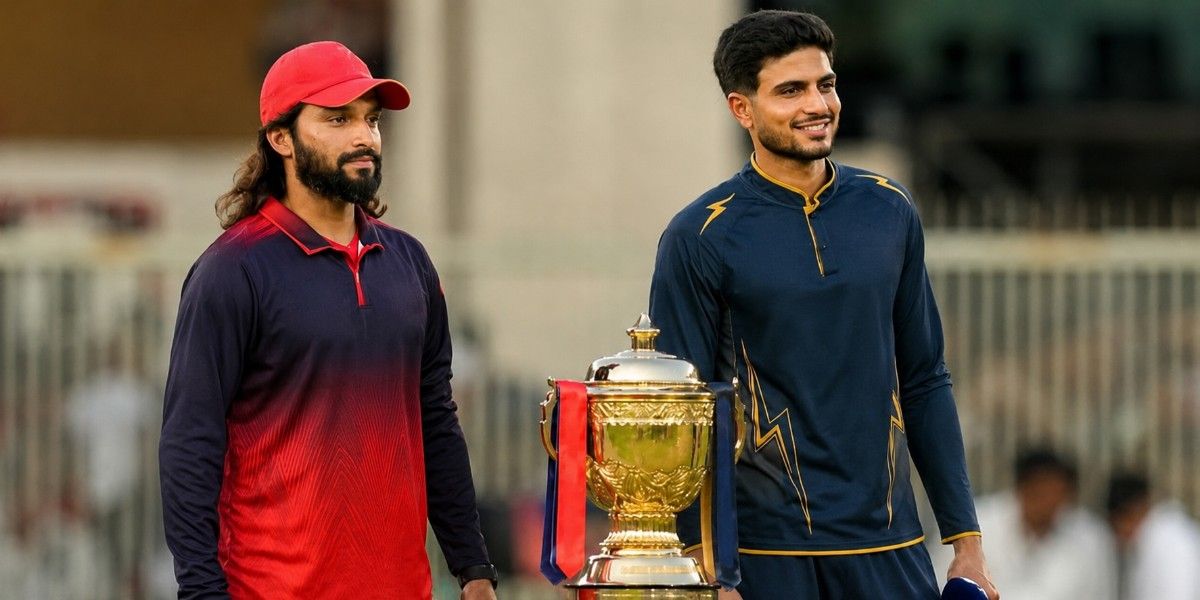 2026 IPL Winner trophy moment with two cricket captains