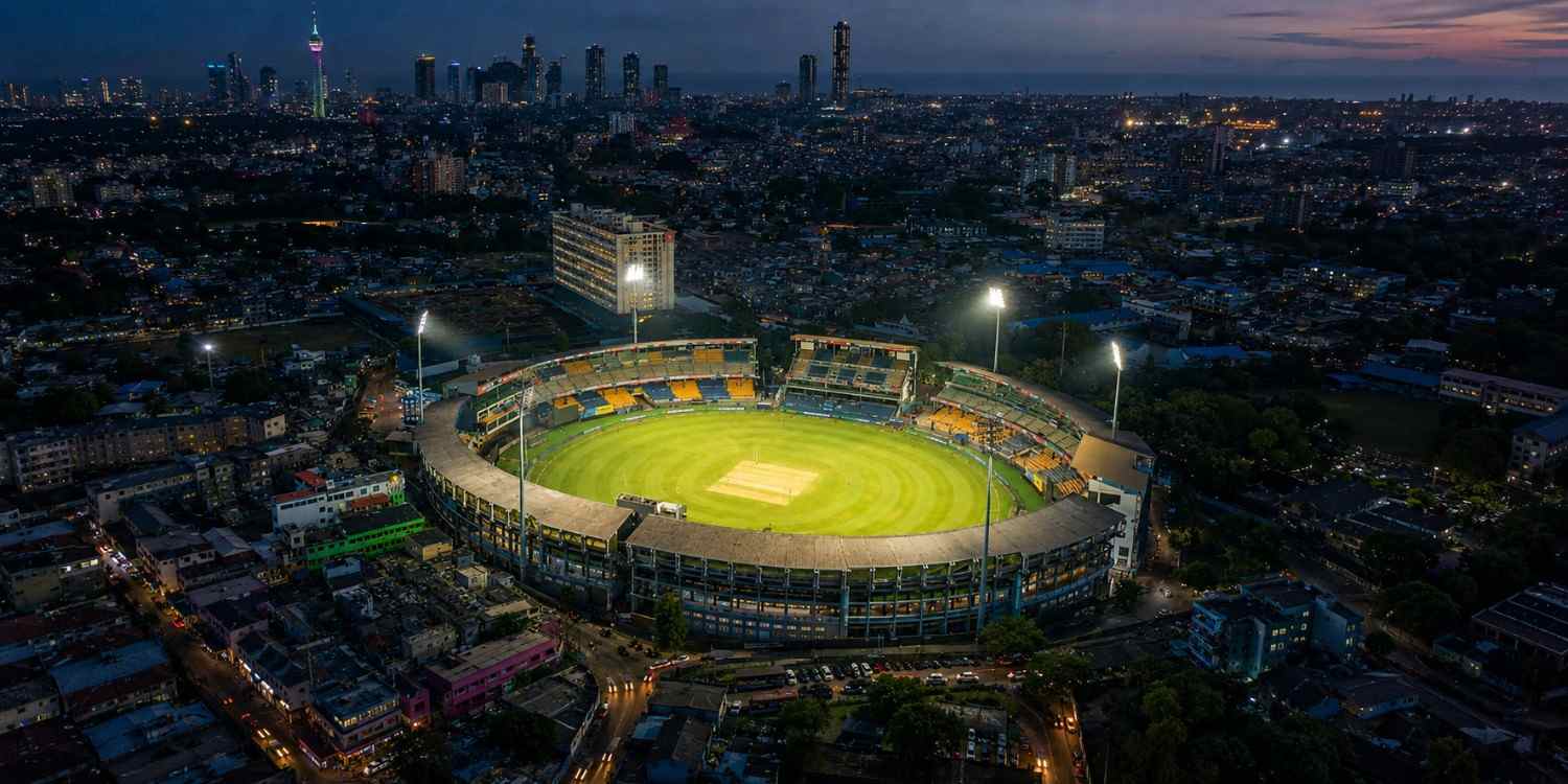 R. Premadasa Stadium aerial view with floodlights illuminating the cricket ground in Colombo